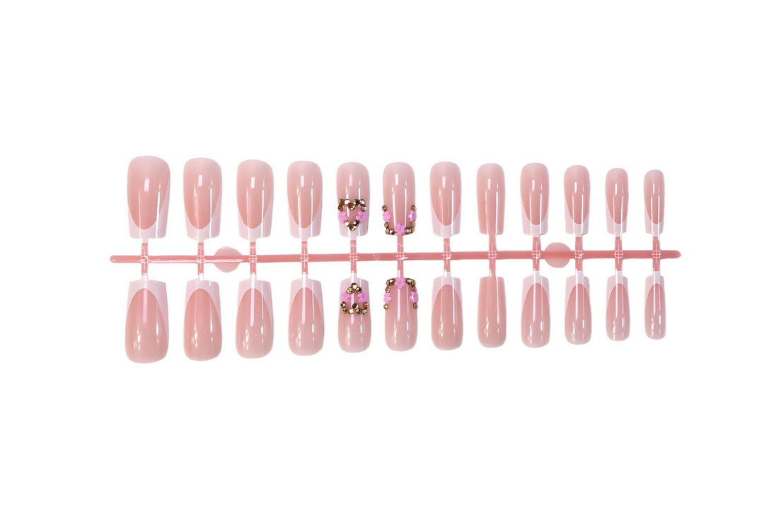 Nail art set with delicate flower and glitter accents Kalsten