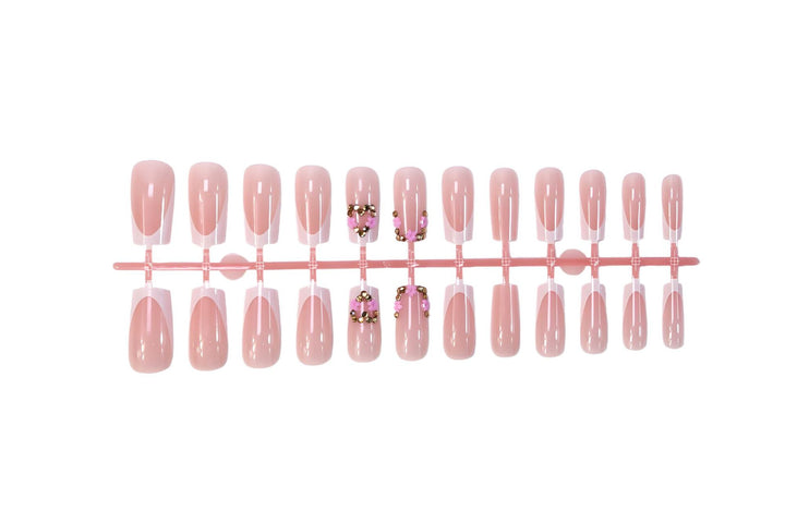 Nail art set with delicate flower and glitter accents Kalsten