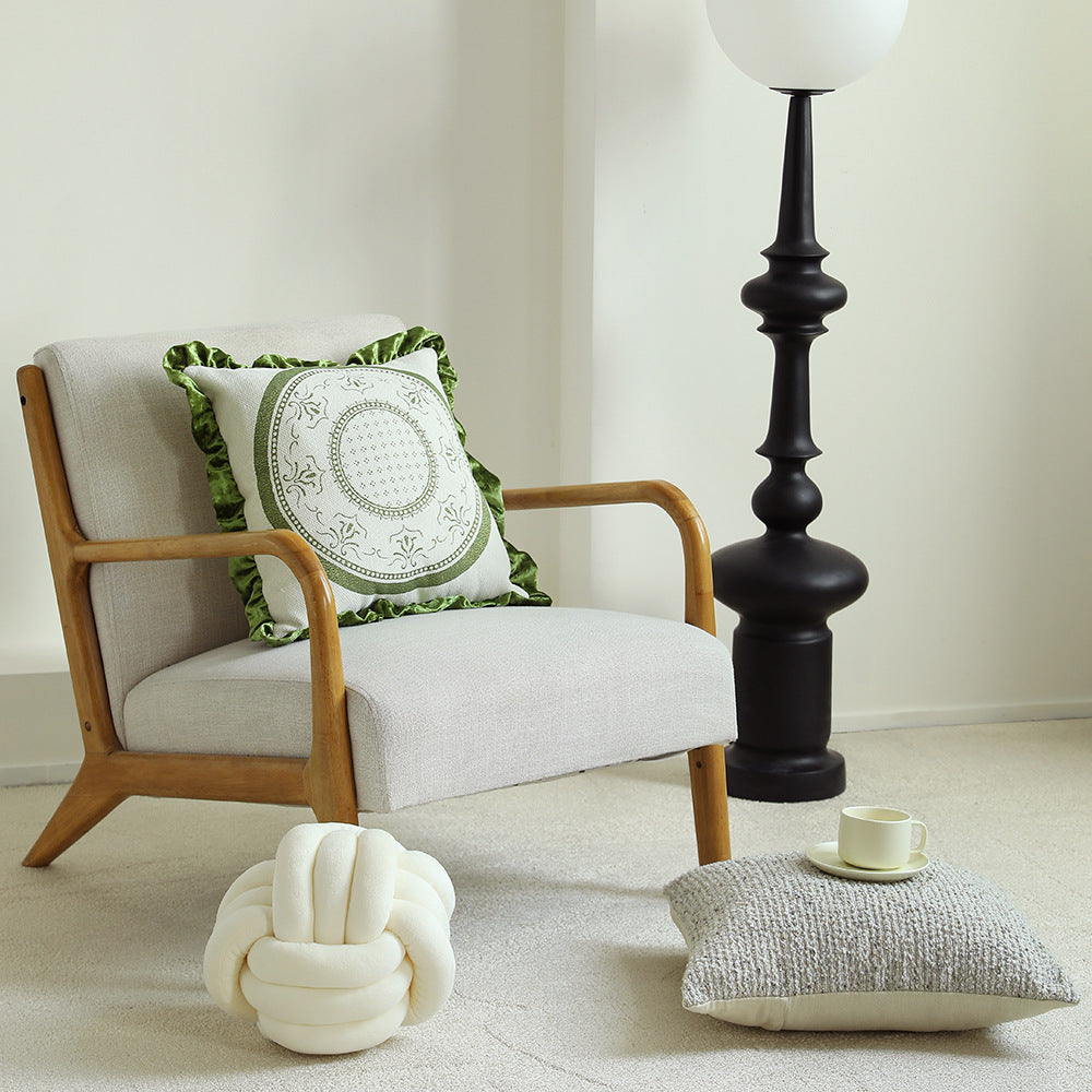 Square decorative pillow in Baroque style with velvet ruffle and putto jacquard