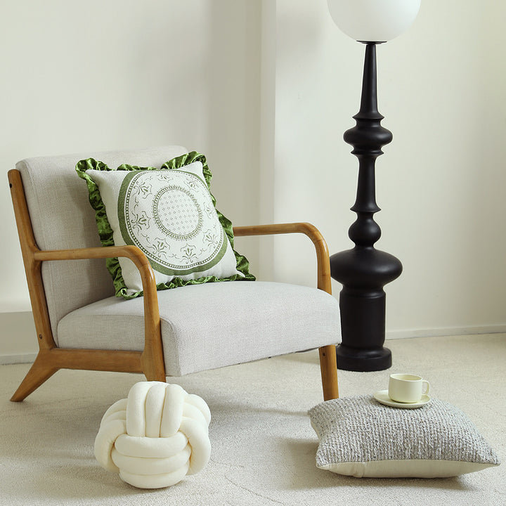 Square decorative pillow in Baroque style with velvet ruffle and putto jacquard