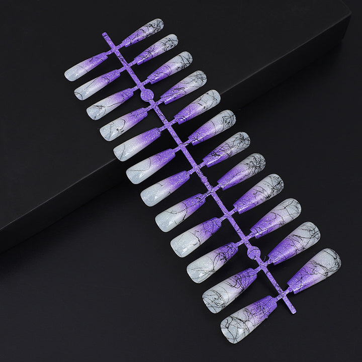 Artificial nails in modern ombre design with marbled accents Kalsten