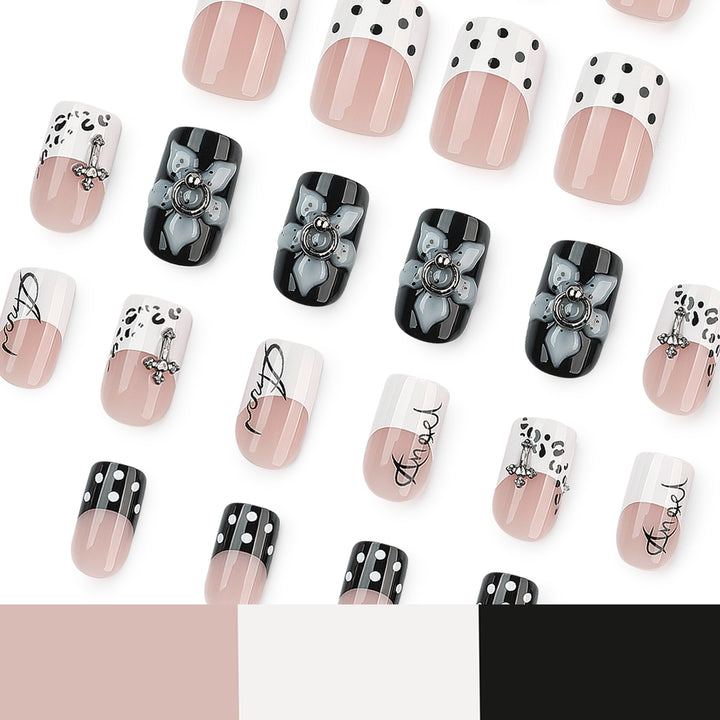 Artful nail extensions with elegant black-and-white design Kalsten