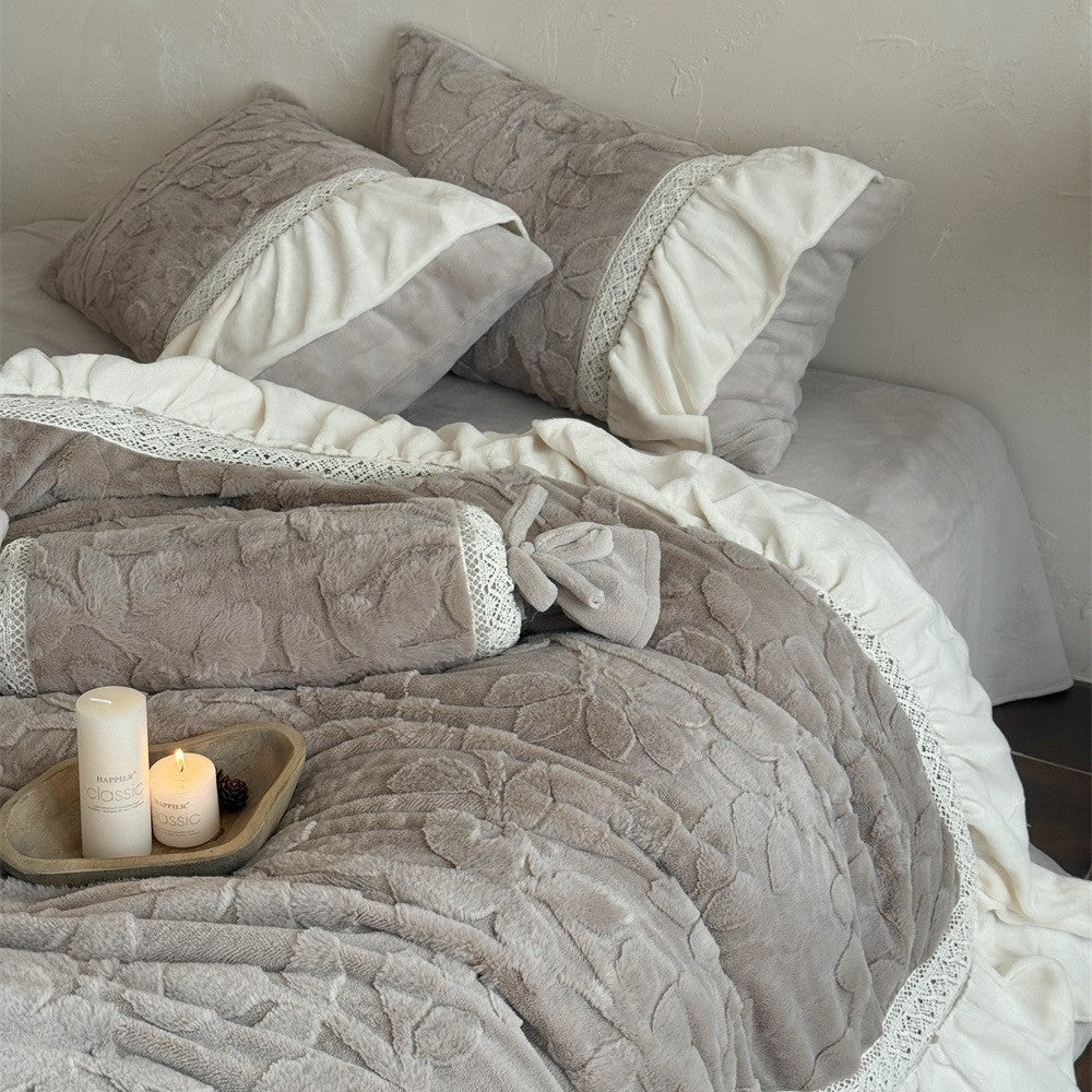 Romantic quilted bedding set with ruffle, floral relief, and neck roll