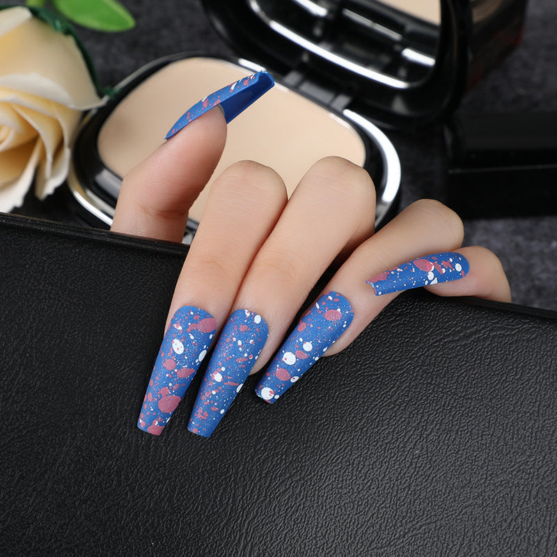 Artistic splatter design artificial nails Kalsten