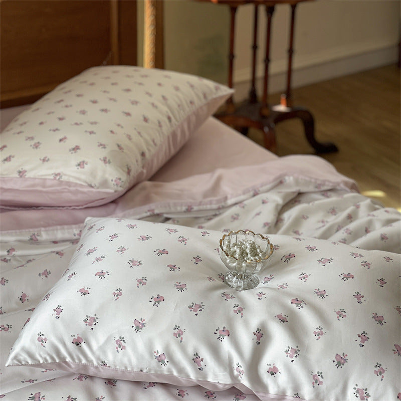 Satin bedding set with floral print and ruffle