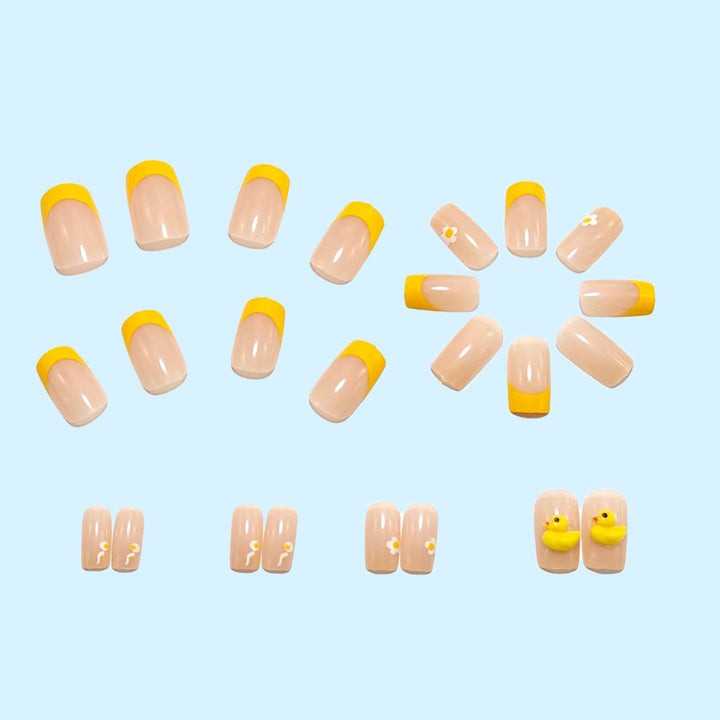 Artificial nails with playful duck motif and spring accents Kalsten