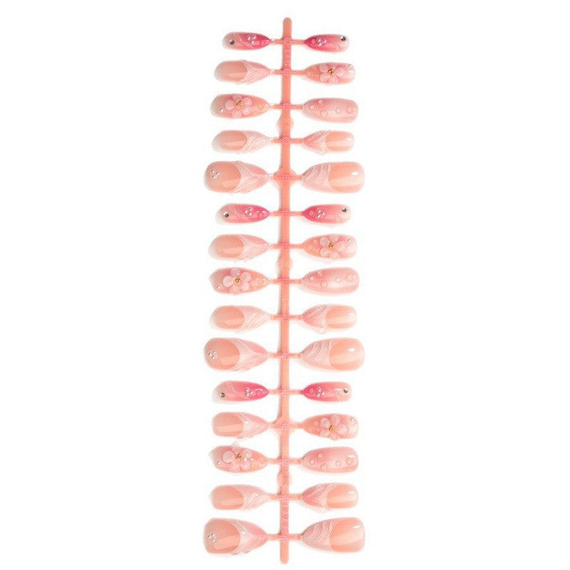Artificial nail set with delicate floral and glitter accents Kalsten