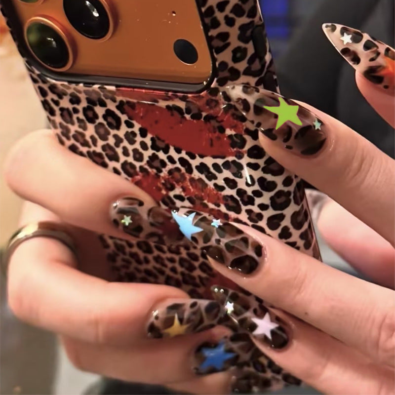 Acrylic nail set with animal pattern and colorful star accents Kalsten