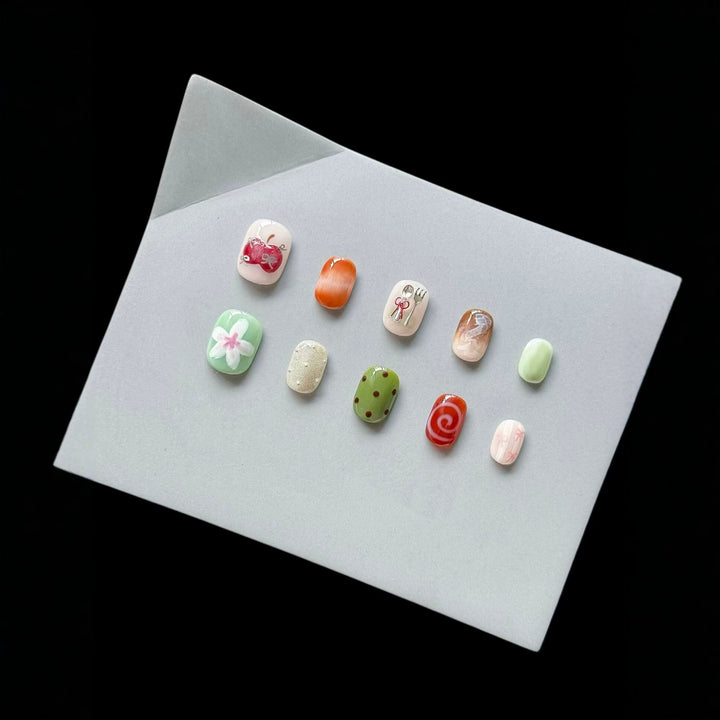 Artistic Press-On Nail Set with Unique Sketch Designs
