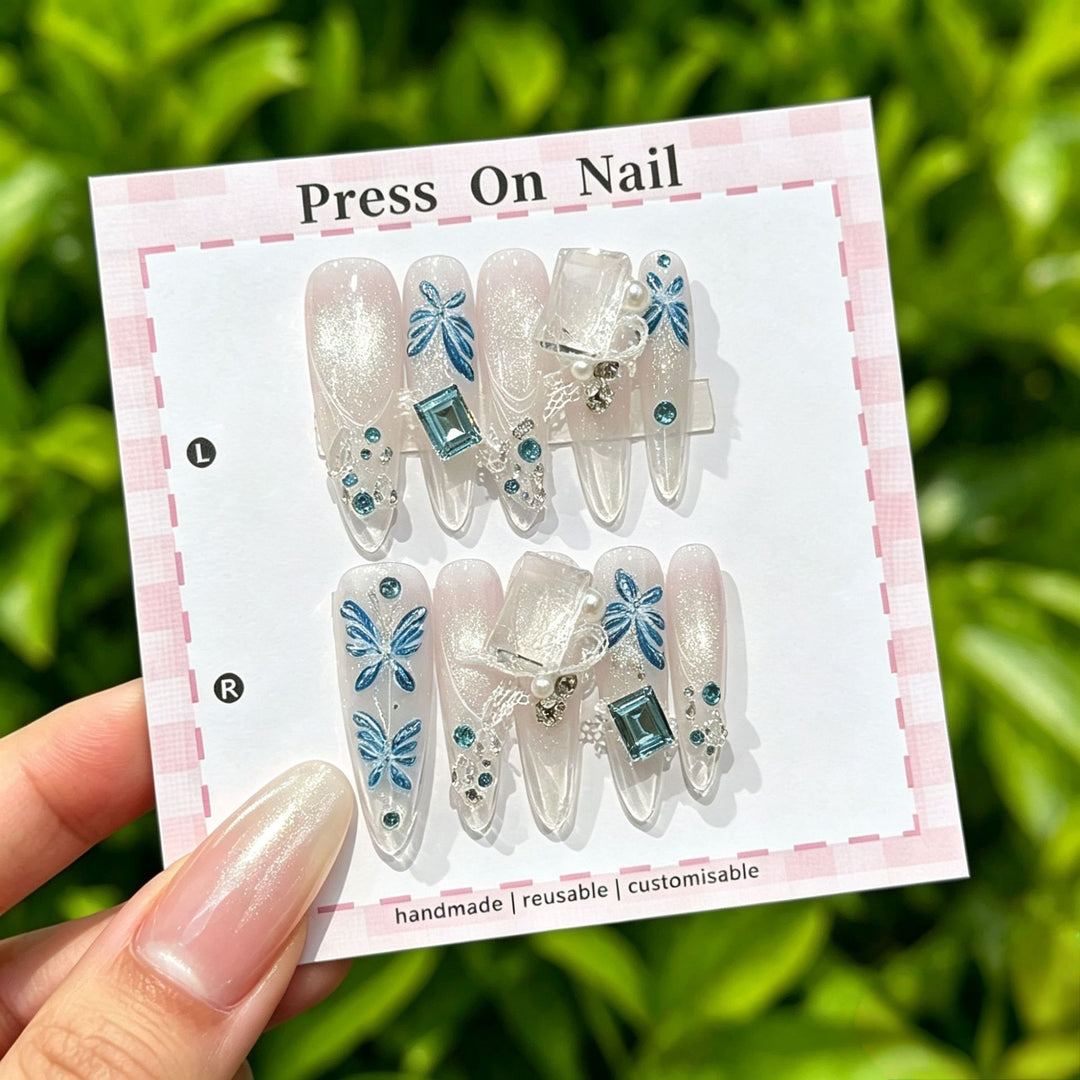 Artistic Press-On Nail Set with Tropical and Floral Accents
