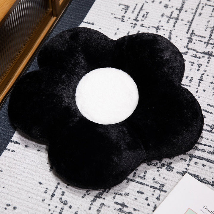 Padded seat cushion in flower shape with faux leather center piece and fluffy edge padding