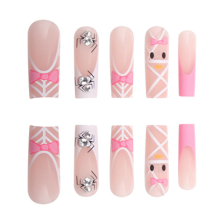 Artistic Press-On Nail Extensions with Spider and Bow Design Kalsten