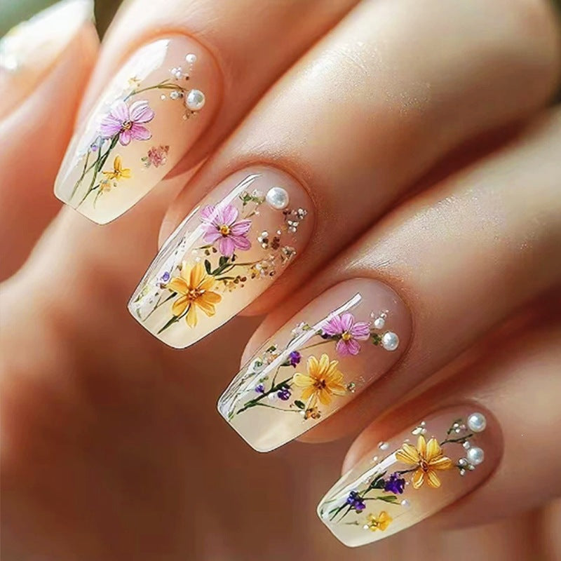 Artificial nail set with floral embellishments and glamorous details Kalsten