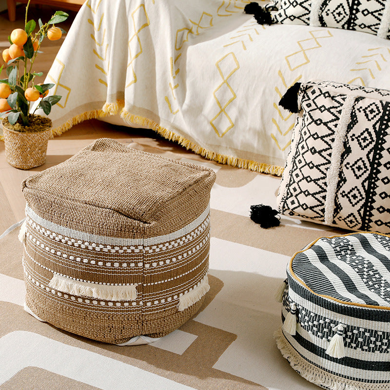 Padded pouf seat ottoman with woven structure and carrying handle