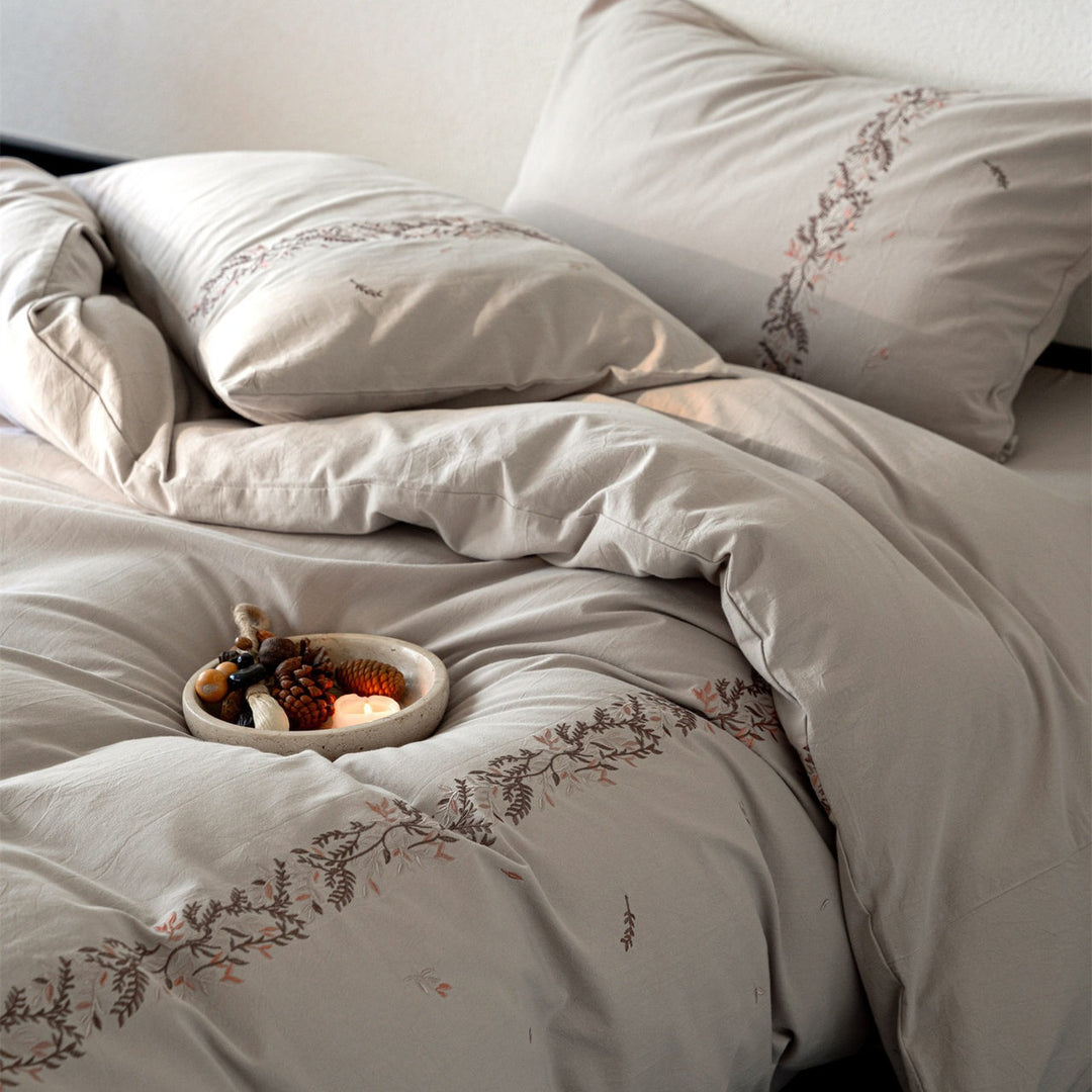 Embroidered cotton percale duvet cover set with fine floral border