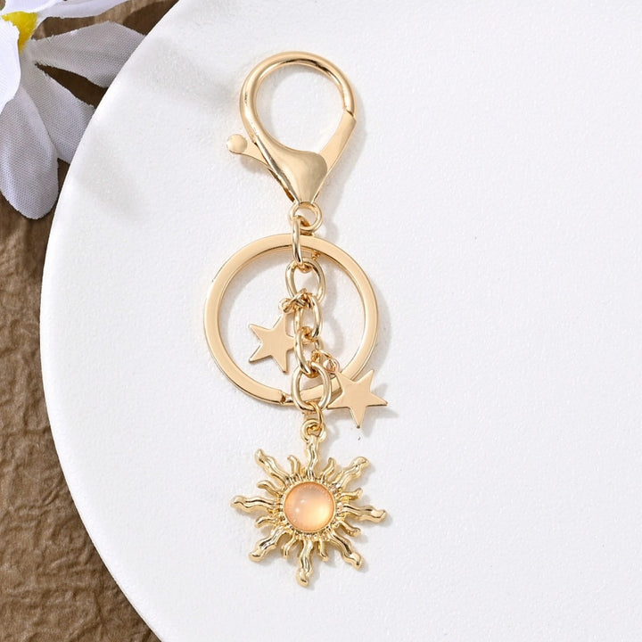 Keychain with Sparkling Sun Motif Kalsten
