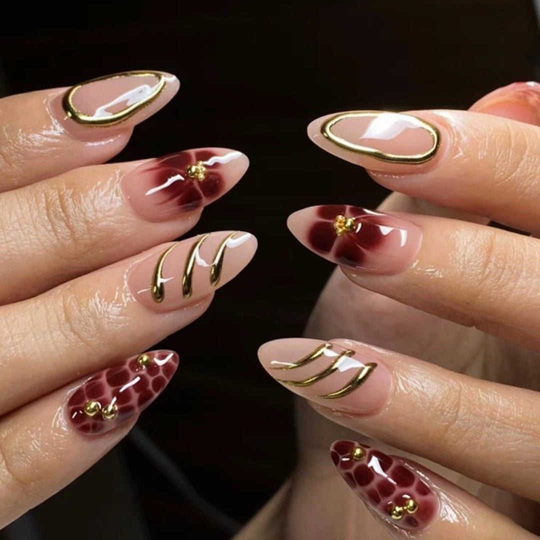 Artistic Nail Art with Elegant Embellishments Kalsten