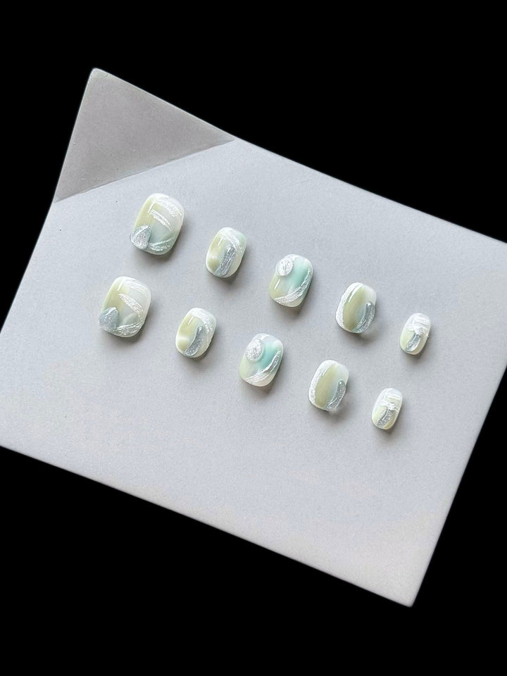 Artistic Press-On Nail Set with Glossy Marble Design