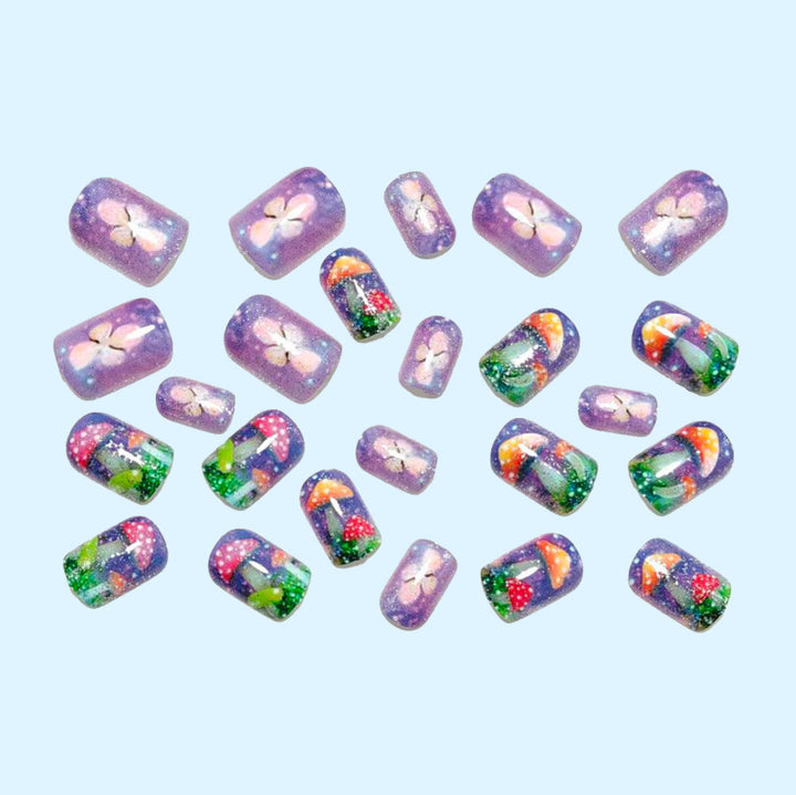 Creative nail design with mushroom and glitter accents Kalsten