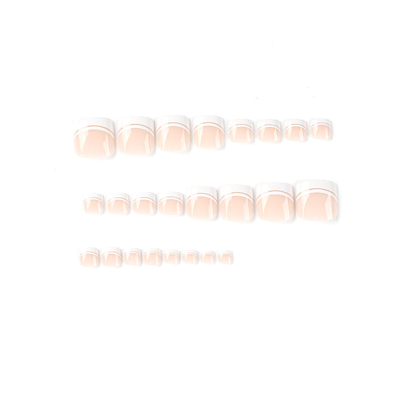 Artful toenail art with elegant French tip design Kalsten