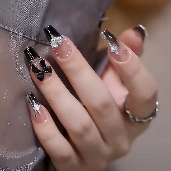Acrylic nail set with glamorous 3D decorations and noble accents Kalsten