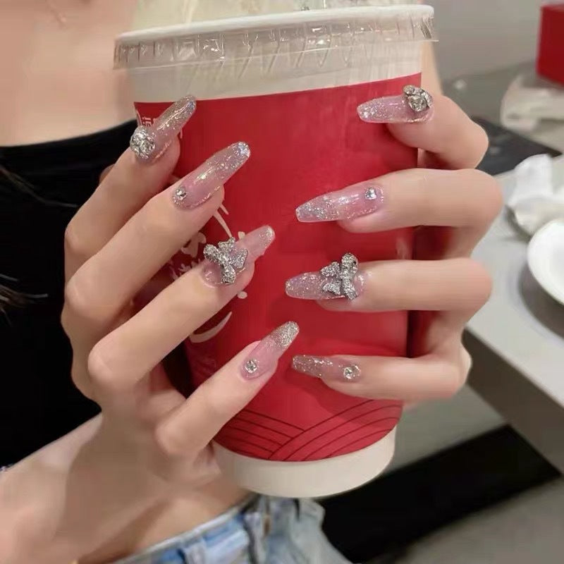 Glamorous artificial nails with sparkling accents Kalsten