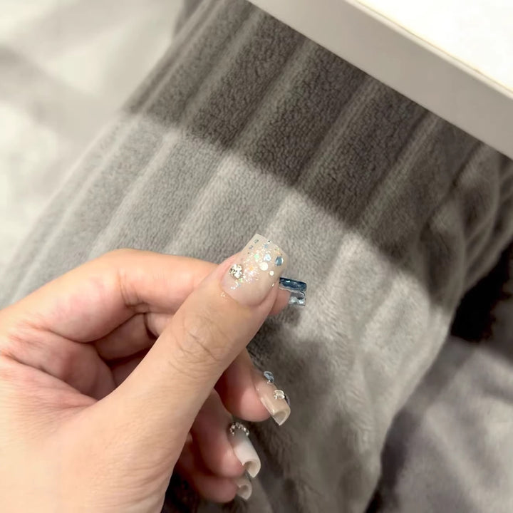 Decorative Nail Art with Crystal Accents