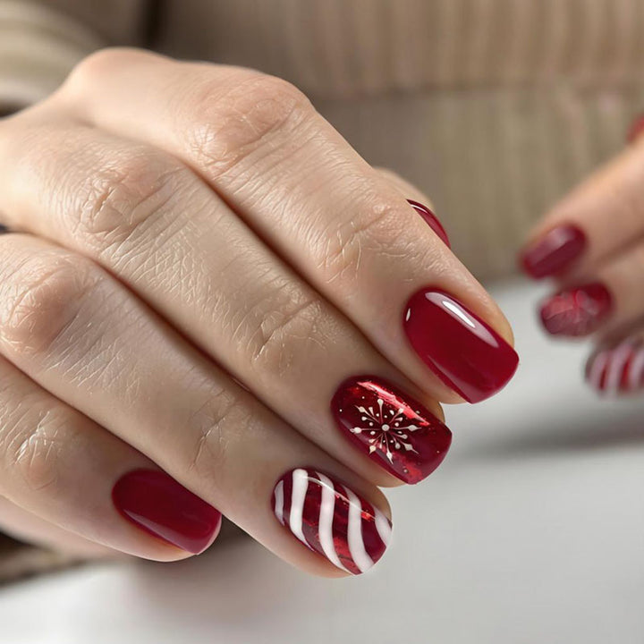 Artificial nail set with festive winter motifs and glitter accents Kalsten