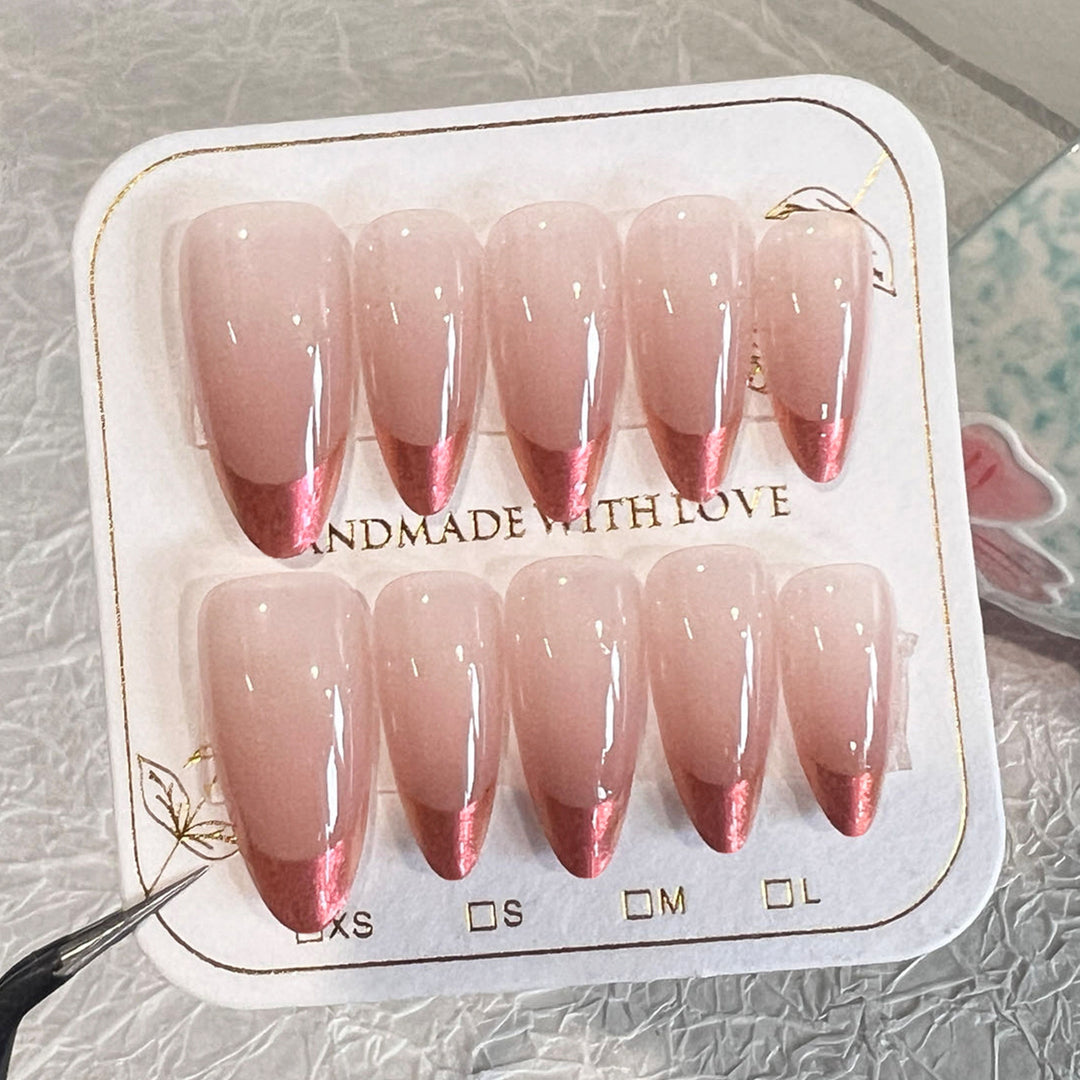 Artificial nail extensions with elegant ombre design Kalsten