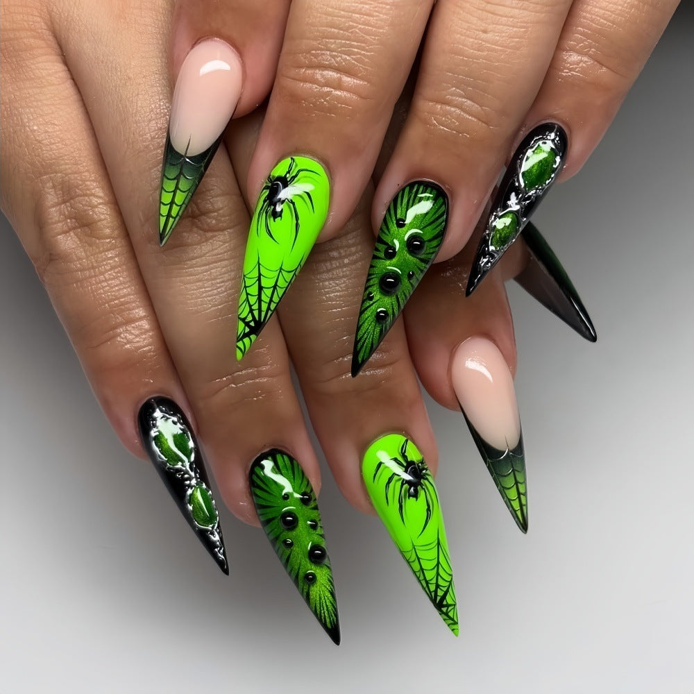 Creative artificial nails with creepy spider and web design Kalsten