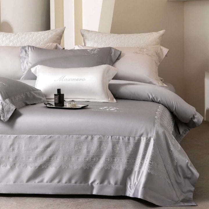 Premium bedding set made of cotton satin with jacquard border and quilted bedspread