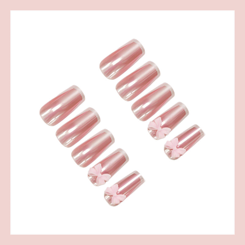 Artificial nail set with stylish bows and elegant French tips Kalsten