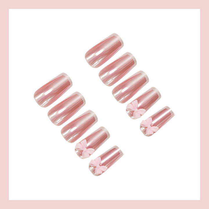 Artificial nail set with stylish bows and elegant French tips Kalsten