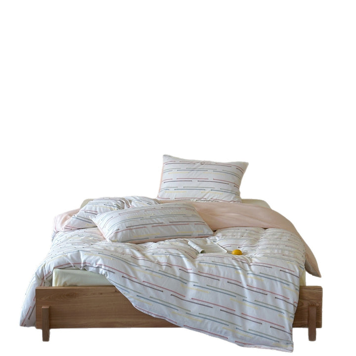 Bedding set made of cotton percale with subtle stripe and pompom design