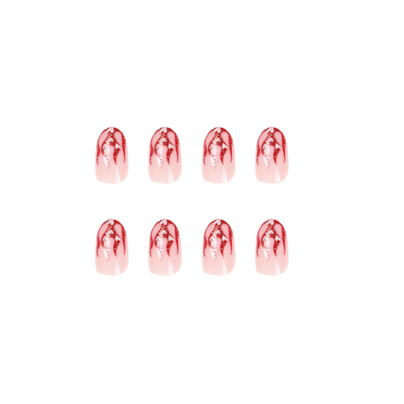 Artificial nail art with romantic heart and flame design Kalsten