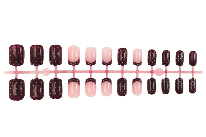 Art nail set with elegant French tips and playful accents Kalsten