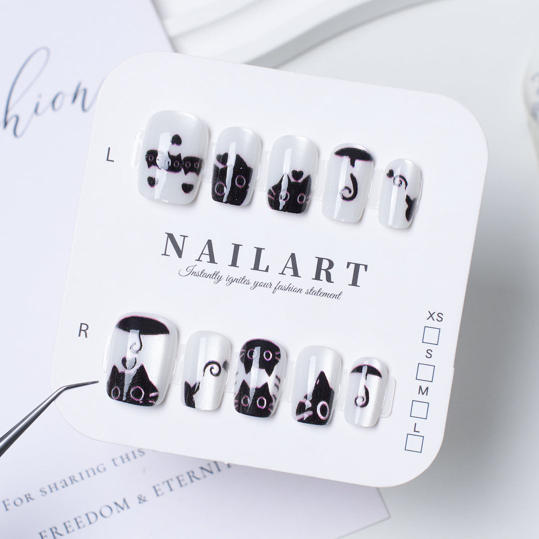 Decorative Press-On Nail Extensions with Bow and Rhinestone Accents Kalsten
