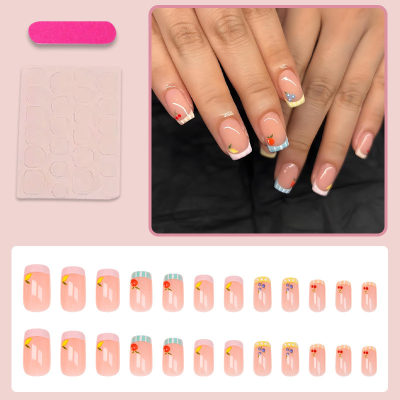 Nail art set with cheerful fruit designs and colorful accents Kalsten