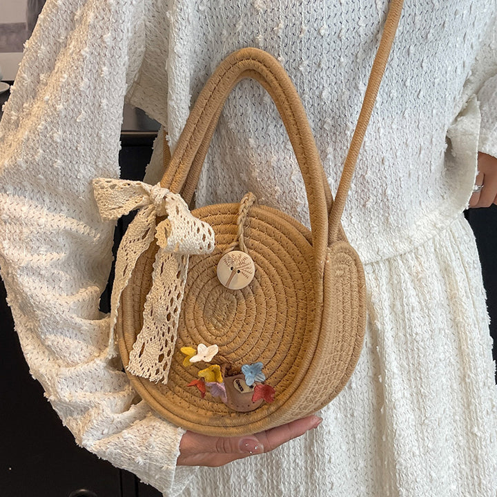Handcrafted Floral Accent Straw Bag