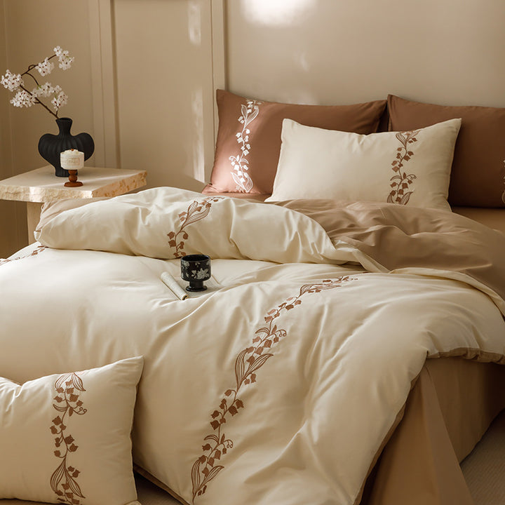 Embroidered bedding set made of cotton satin with floral vine embroidery