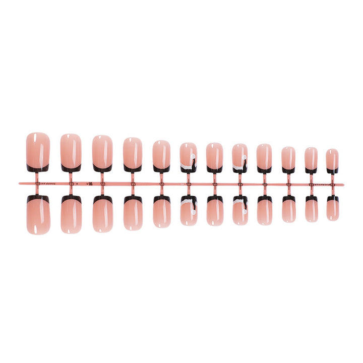 Art nail set with stylish French tip and elegant accents Kalsten
