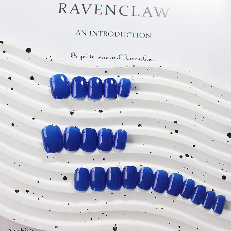 Artificial nail set with luxurious and glossy blue designs Kalsten