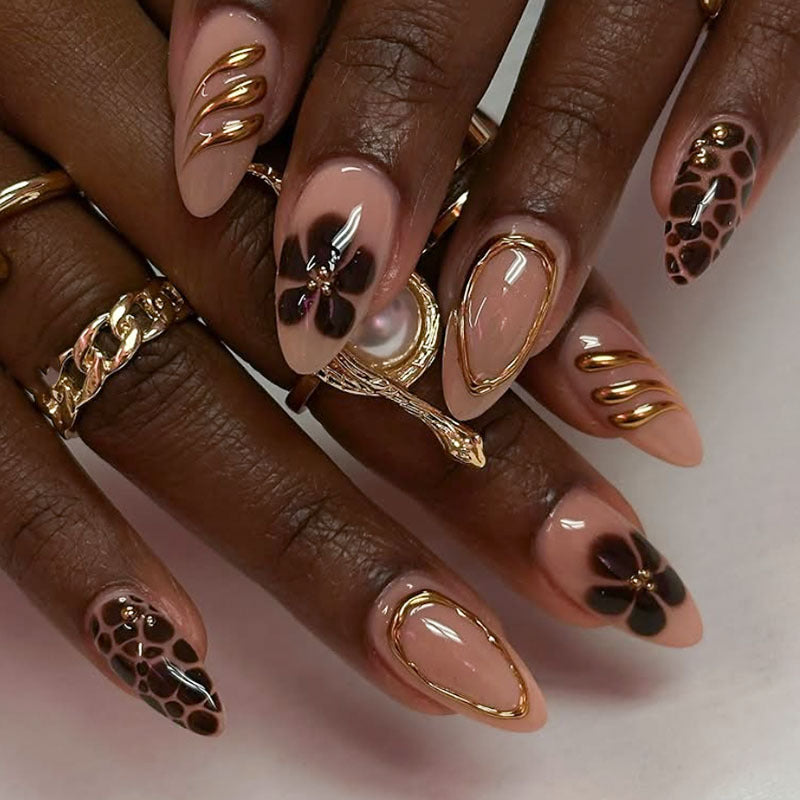 Artistic Press-On Nail Set with Floral and Gold Accents