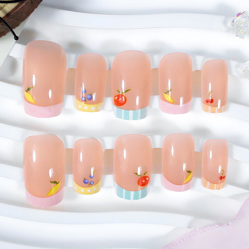 Nail art set with cheerful fruit designs and colorful accents Kalsten