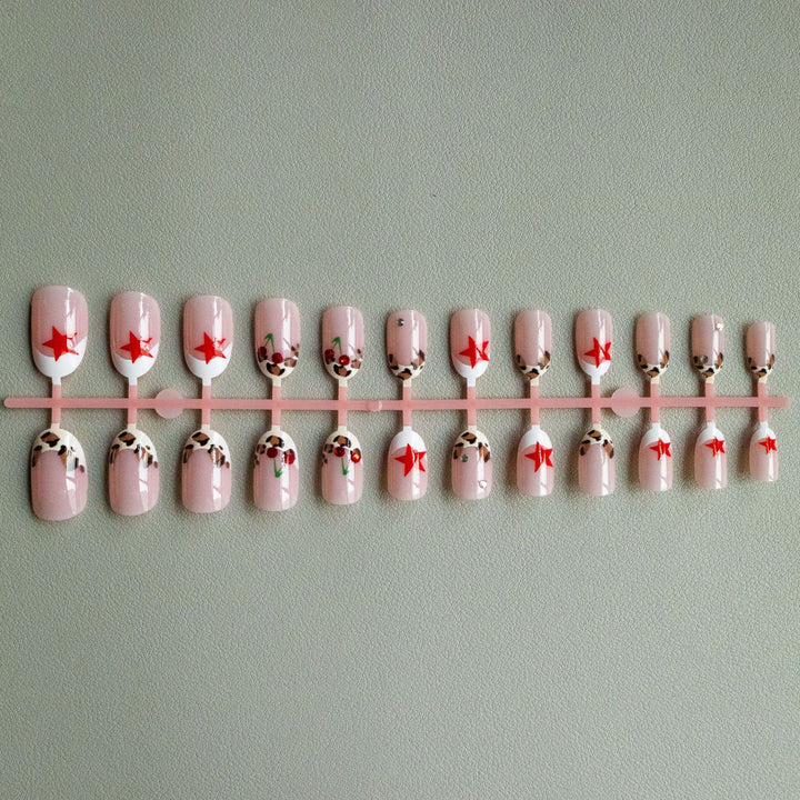 Artistic Animal Print and Star Nail Art