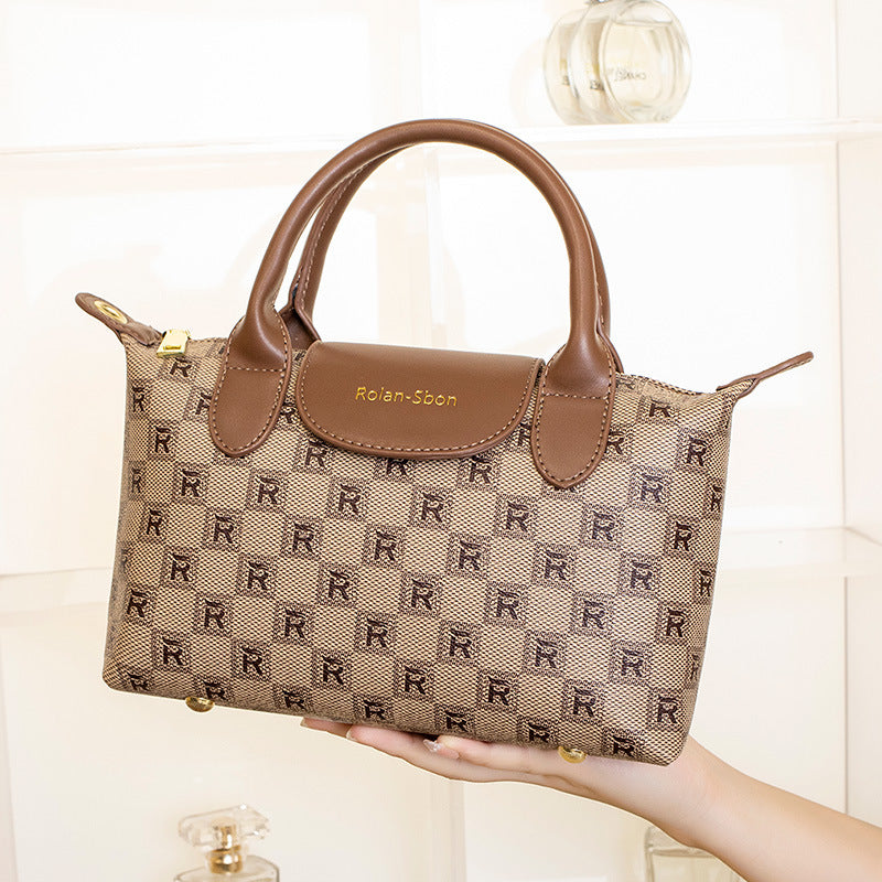 Elegant Designer Handbag with Structured Design