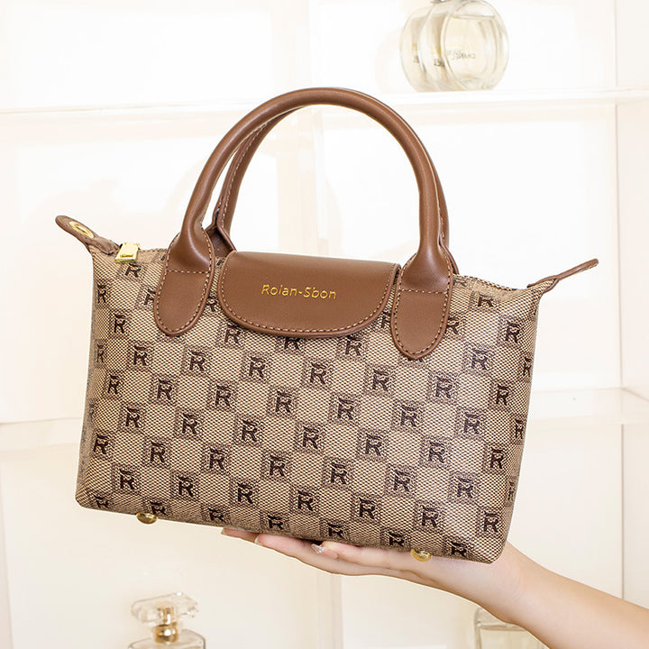 Elegant Designer Handbag with Structured Design