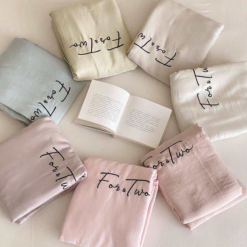 Luxurious cotton satin bedding set with embroidery and contrast piping