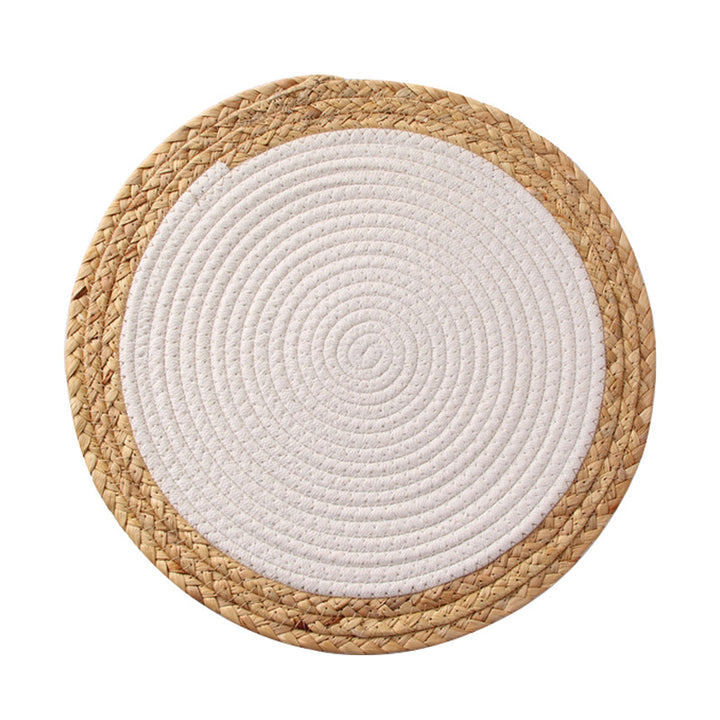 Round handwoven table placemat made of cotton yarn with structured spiral binding
