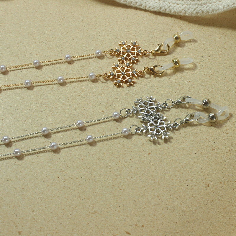 Elegant glasses holder chain with pearls and snowflake pendant Kalsten
